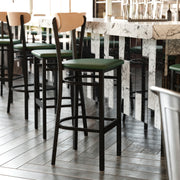 Wright Commercial Barstool with 500 LB. Capacity Black Steel Frame, Natural Birch Finish Wooden Boomerang Back, and Green Vinyl Seat