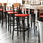 Wright Commercial Barstool with 500 LB. Capacity Black Steel Frame, Natural Birch Finish Wooden Boomerang Back, and Red Vinyl Seat