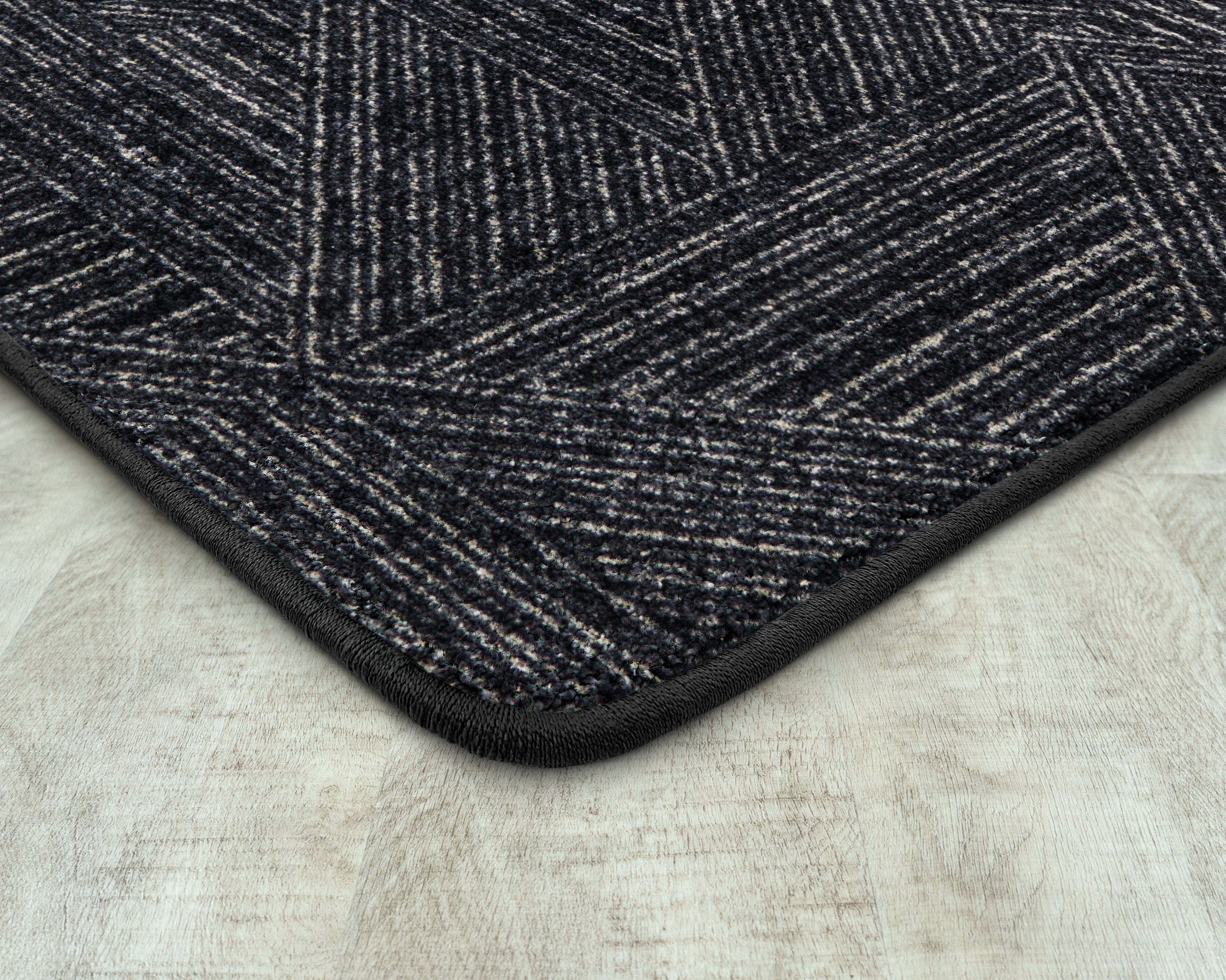Above Board 3'10" x 5'4" area rug in color Onyx