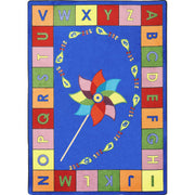Alphabet Pinwheel 7'8" x 10'9" Oval area rug in color Multi