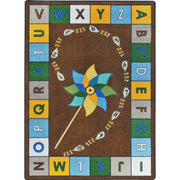 Alphabet Pinwheel 5'4" x 7'8" area rug in color Earthtone