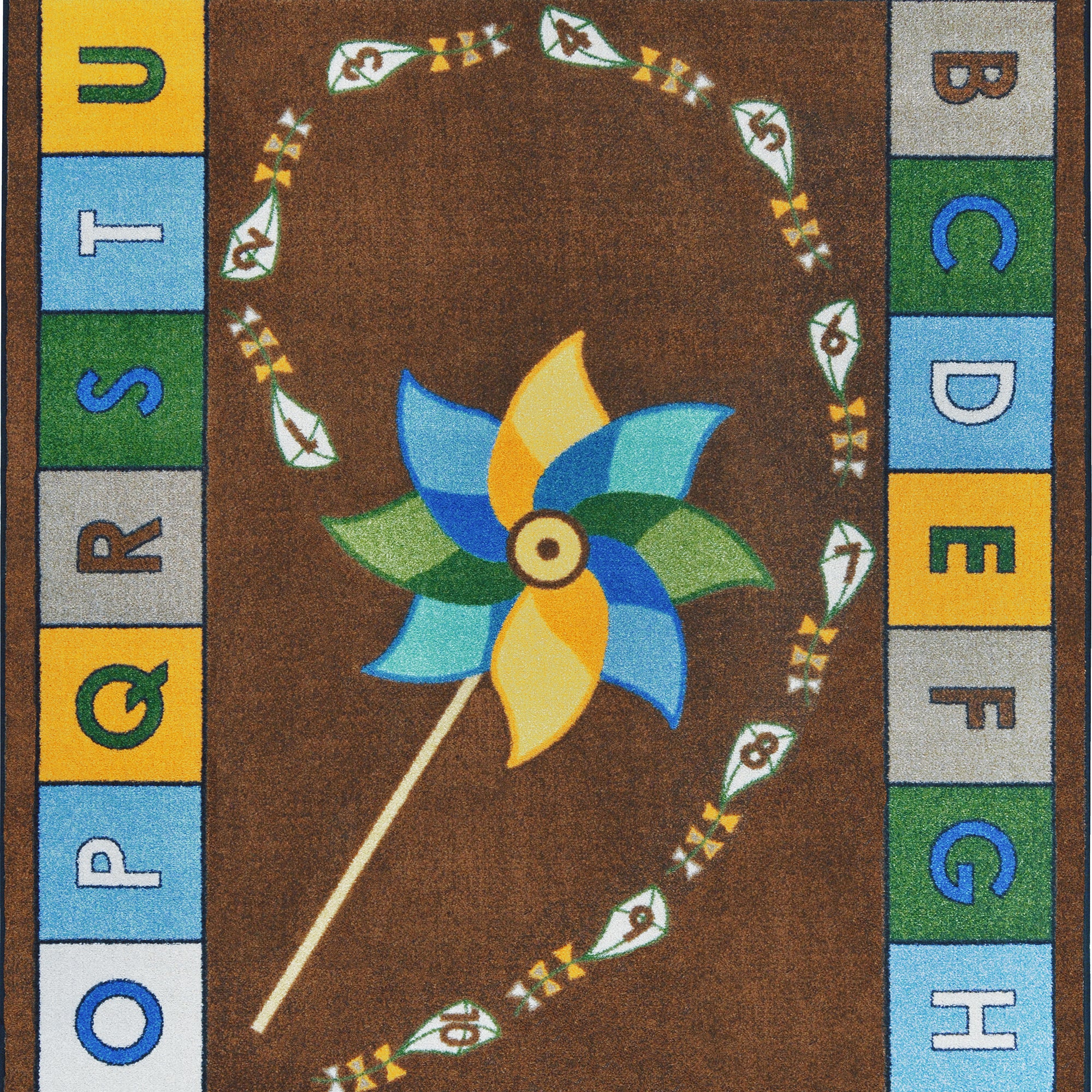 Alphabet Pinwheel 5'4" x 7'8" area rug in color Earthtone