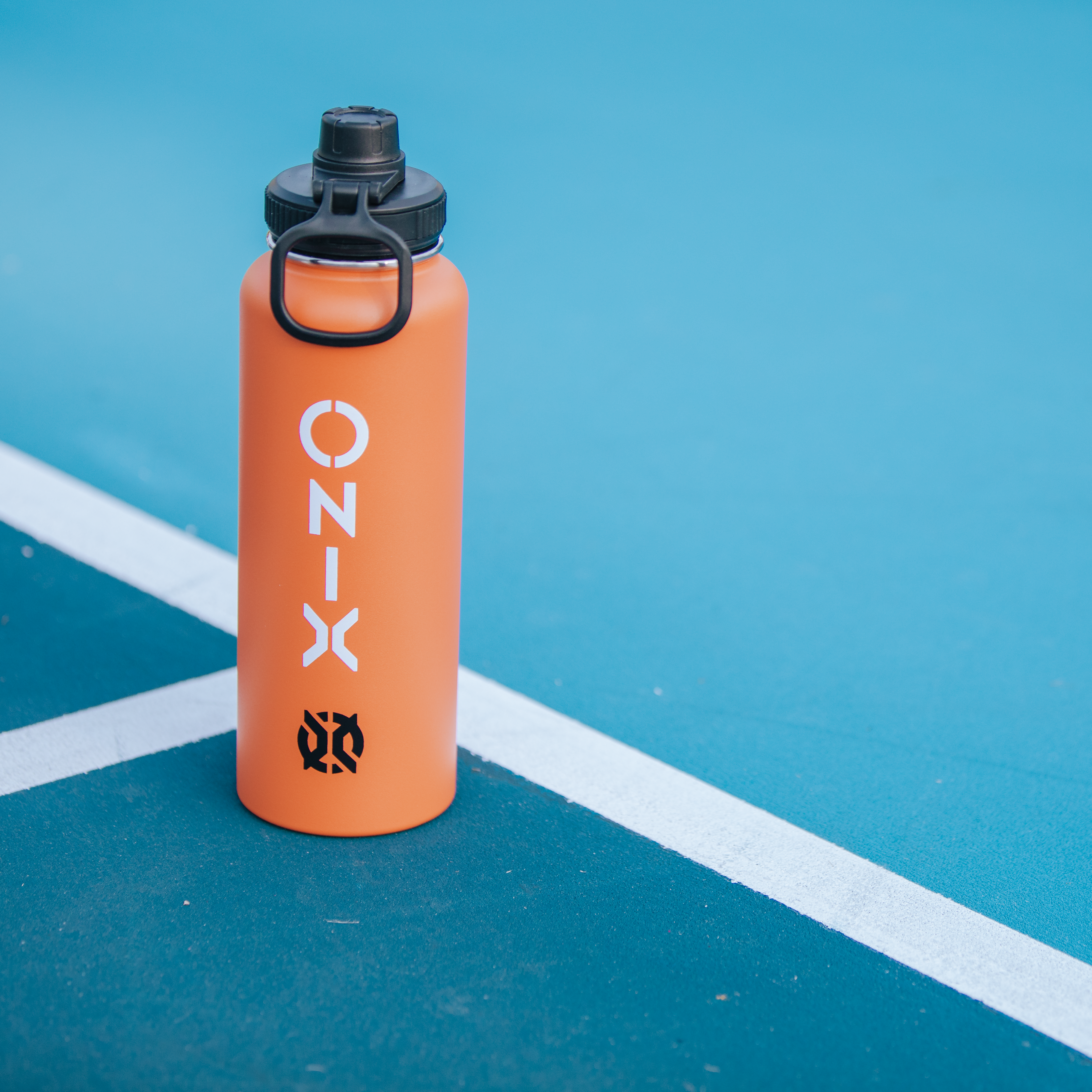 ONIX Pickleball Accessory Stainless Steel Insulated Sweat Proof Dishwasher Safe Double Wall 40 oz. Water Bottle - Orange