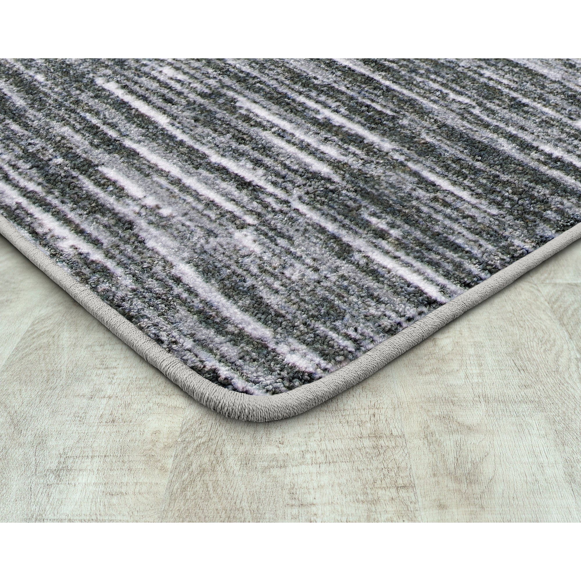 Balanced 5'4" x 7'8" area rug in color Smoke