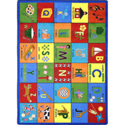 Bilingual Phonics 5'4" x 7'8" area rug in color Multi