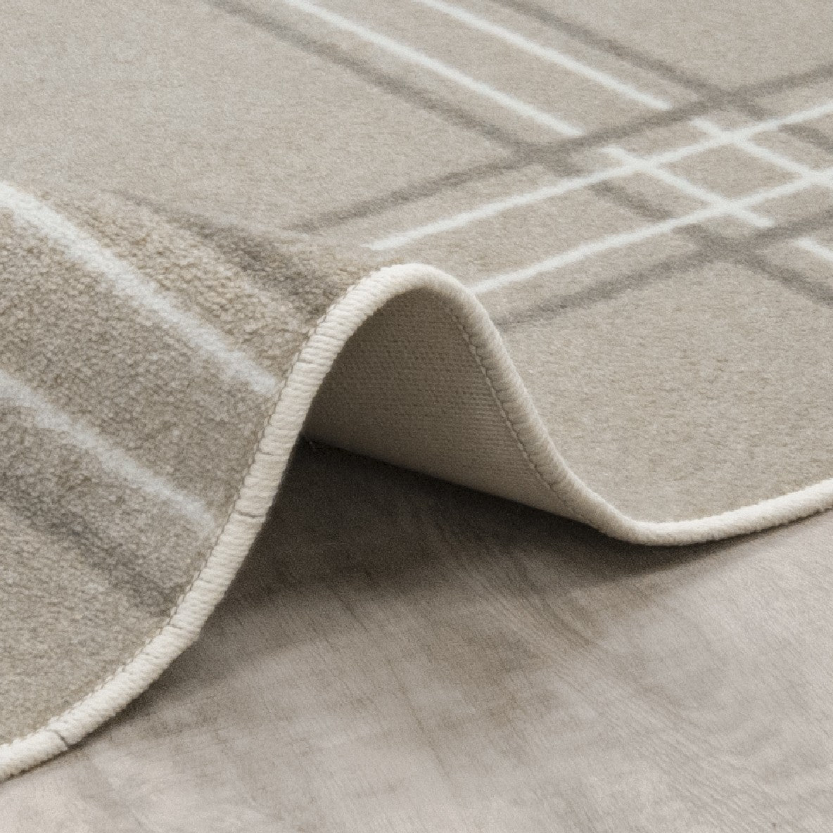 Broadfield 5'4" x 7'8" area rug in color Beige