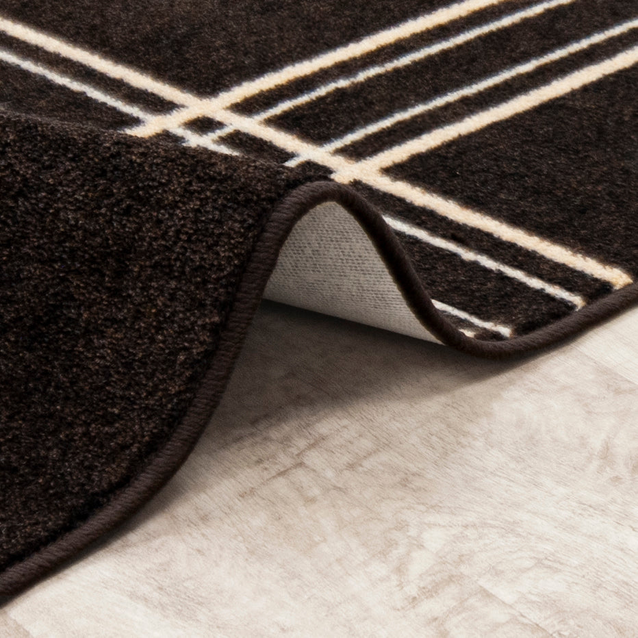 Broadfield 5'4" x 7'8" area rug in color Espresso