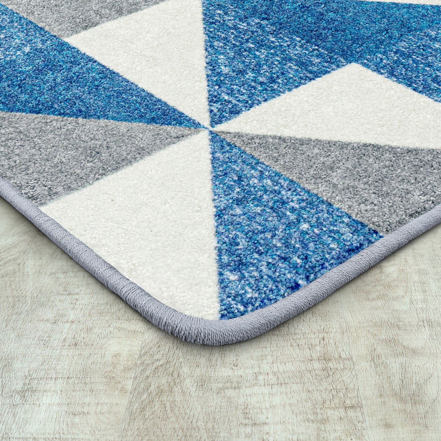 Cartwheel 5'4" x 7'8" area rug in color Blue Skies