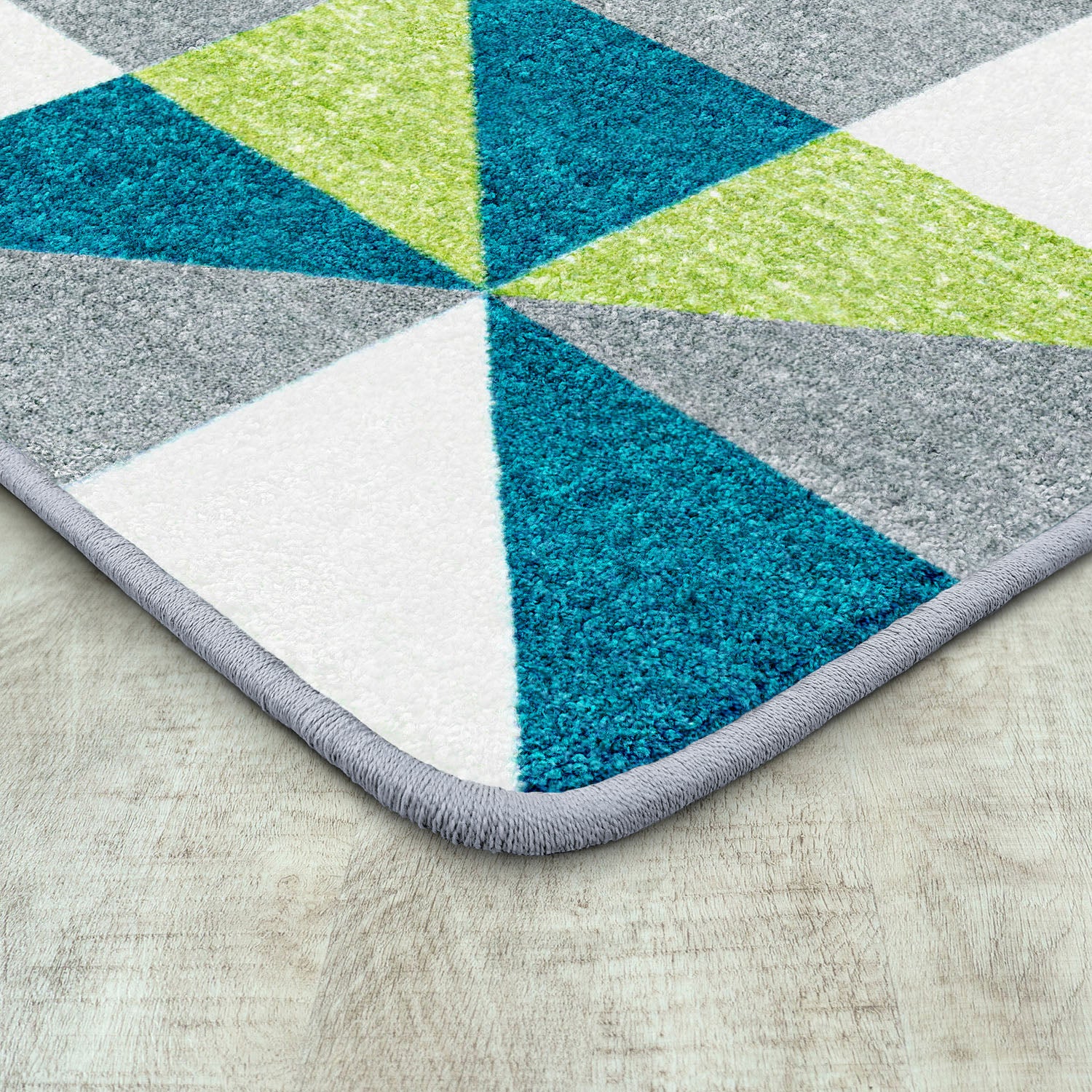 Cartwheel 3'10" x 5'4" area rug in color Calypso