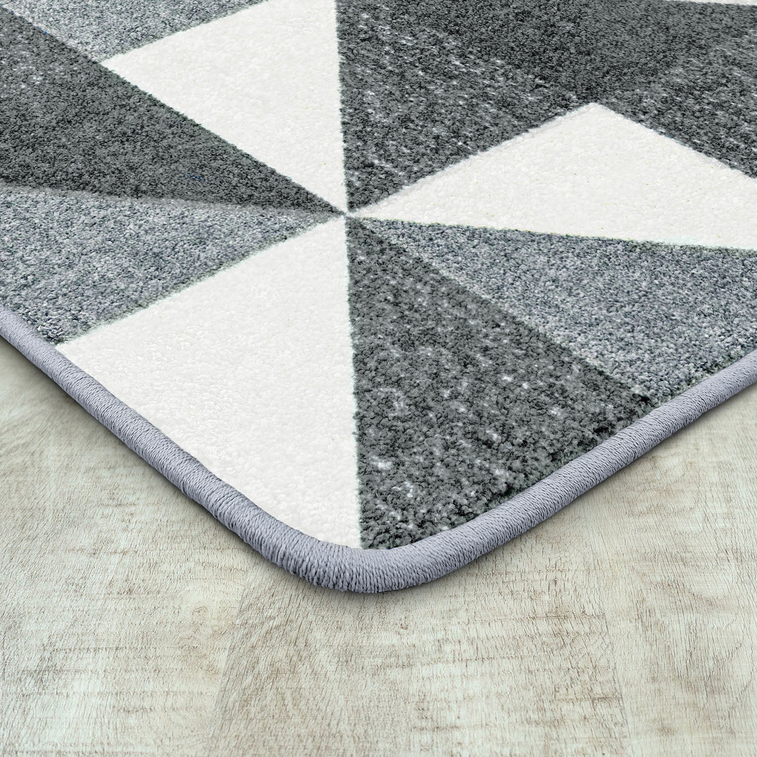 Cartwheel 7'8" x 10'9" area rug in color Cloudy