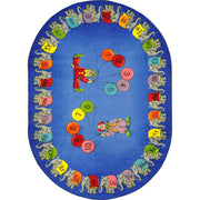 Circus Elephant Parade 5'4" x 7'8" Oval area rug in color Multi