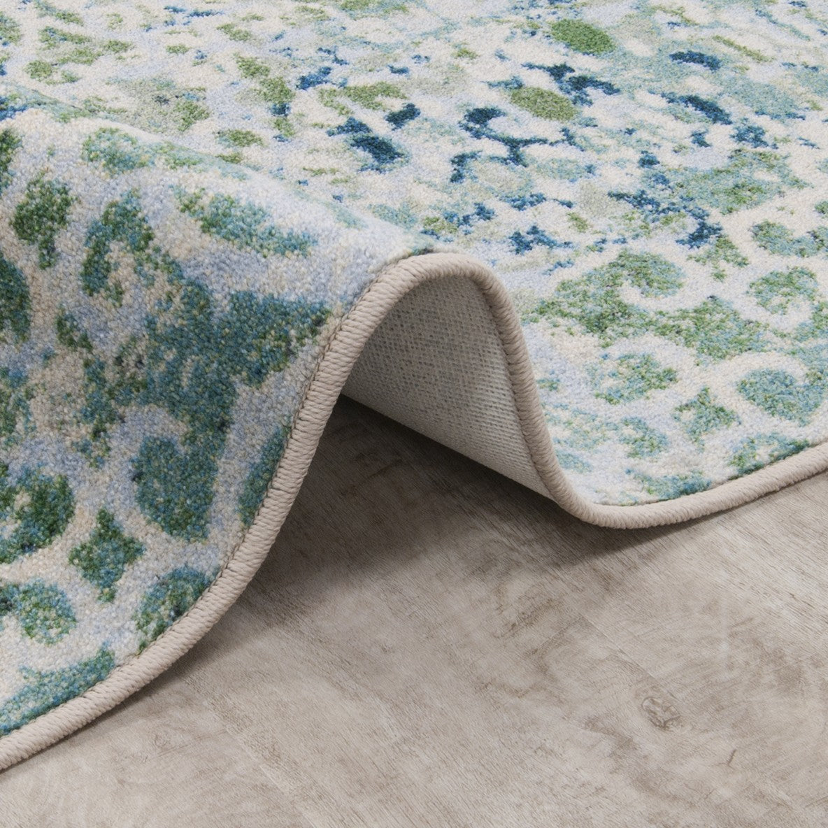 Composite 3'10" x 5'4" area rug in color Sea Green