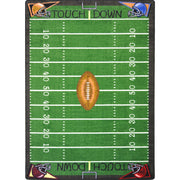 Football Fun 5'4" x 7'8" area rug in color Multi
