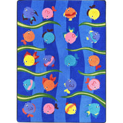 Friendly Fish 5'4" x 7'8" area rug in color Multi