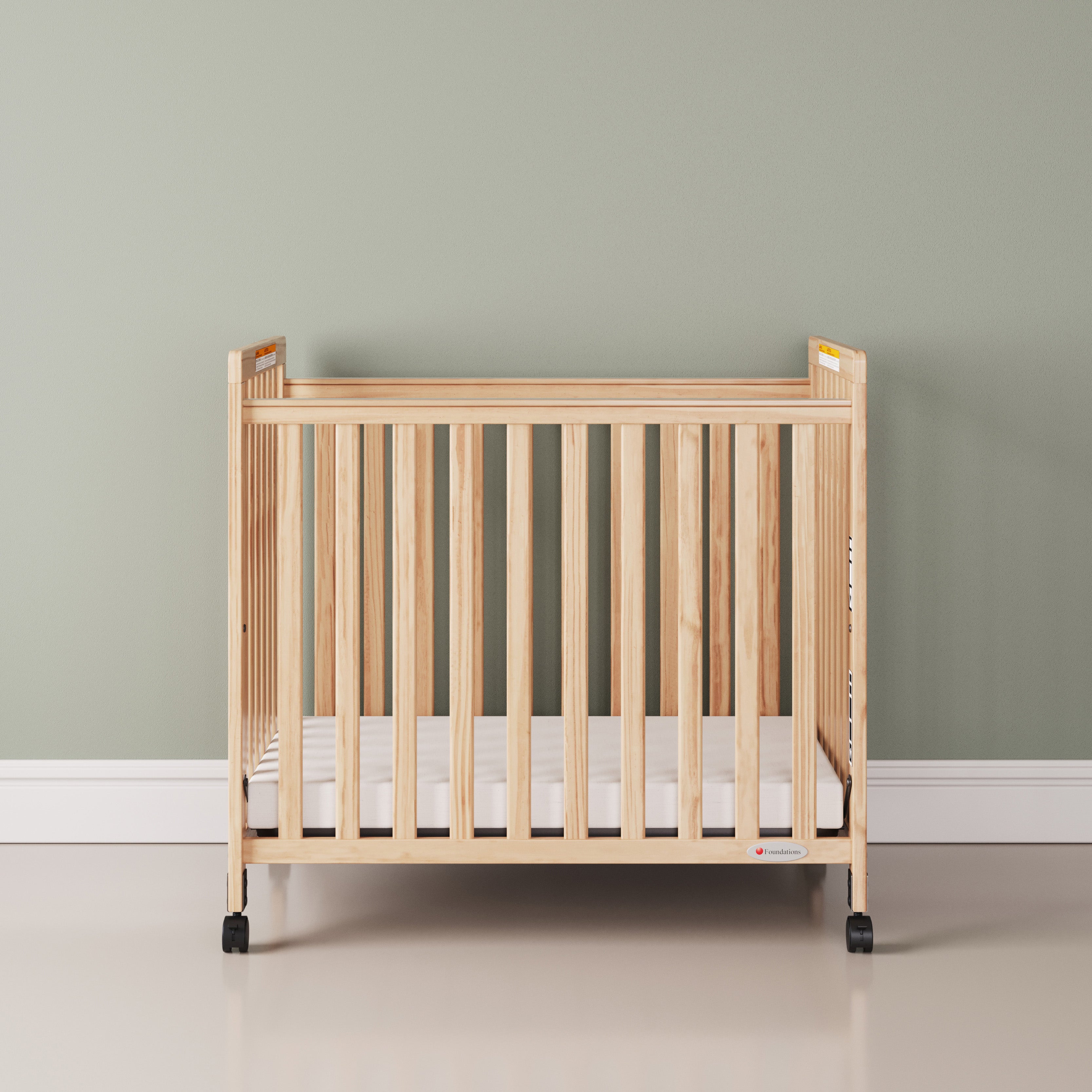 SafetyCraft® Fixed-Side Compact Wood Crib, Slatted End Panels
