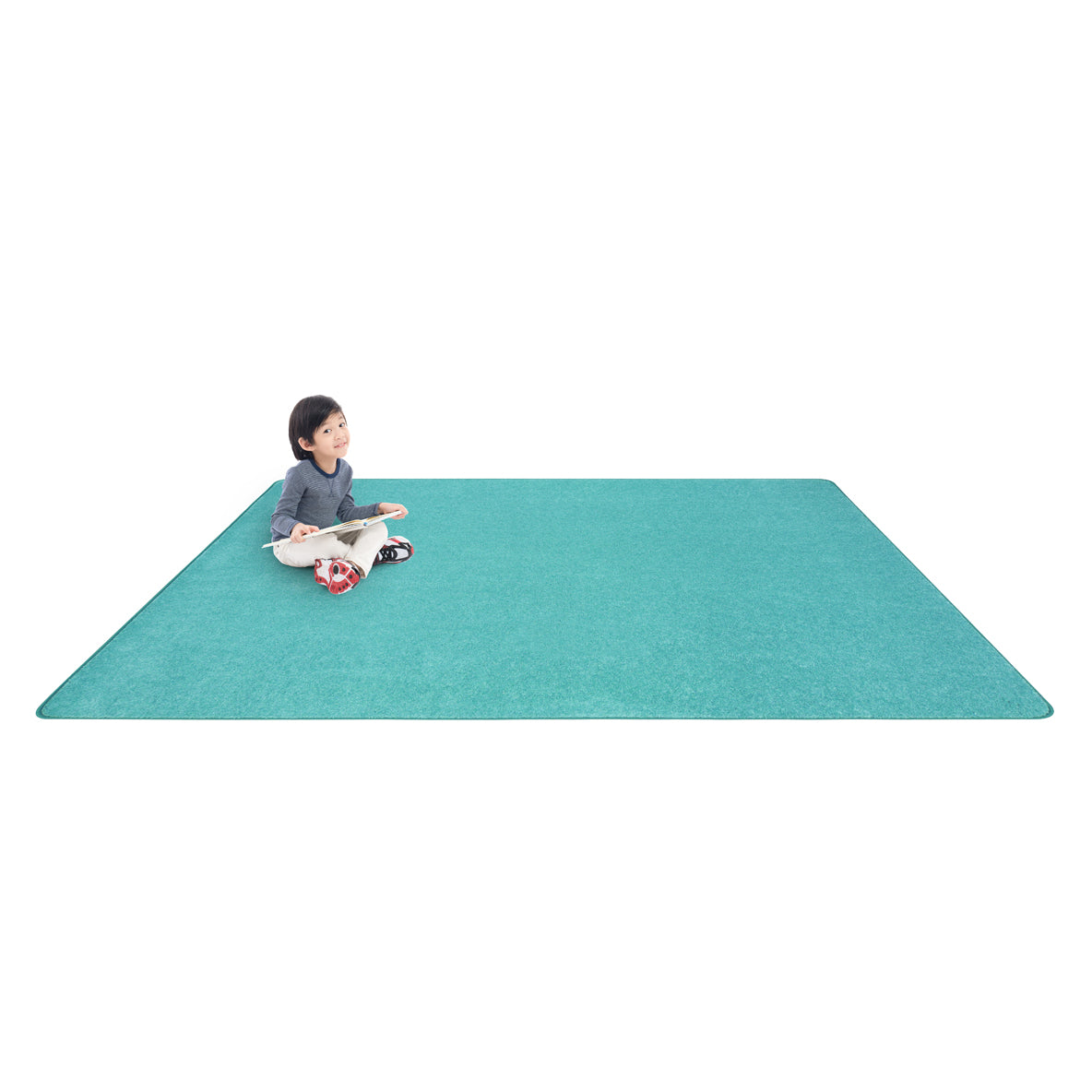 Just Kidding 12' x 6' area rug in color Seafoam