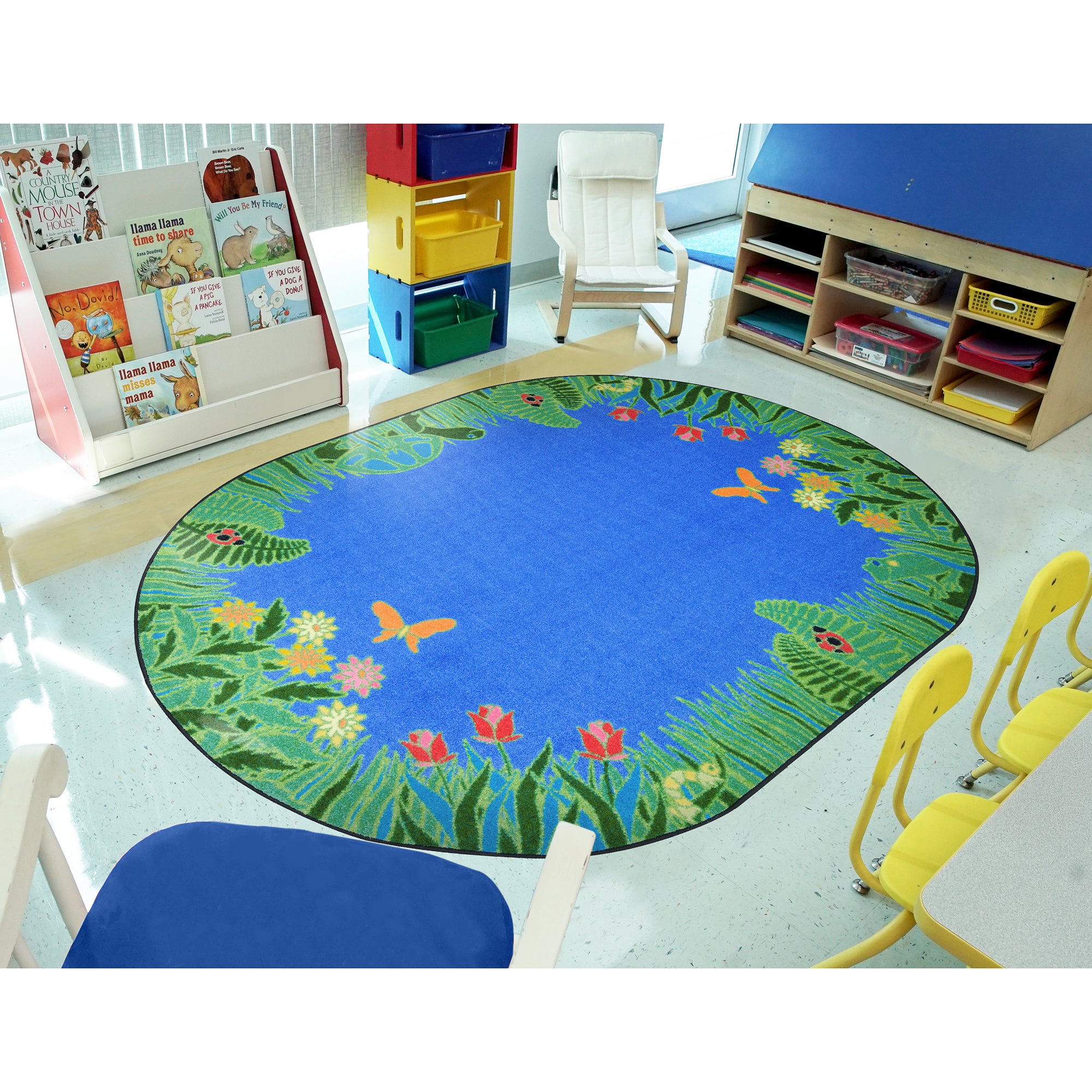Merry Meadows 10'9" x 13'2" Oval area rug in color Blue