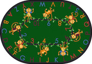 Monkey Business 7'8" x 10'9" Oval area rug in color Green