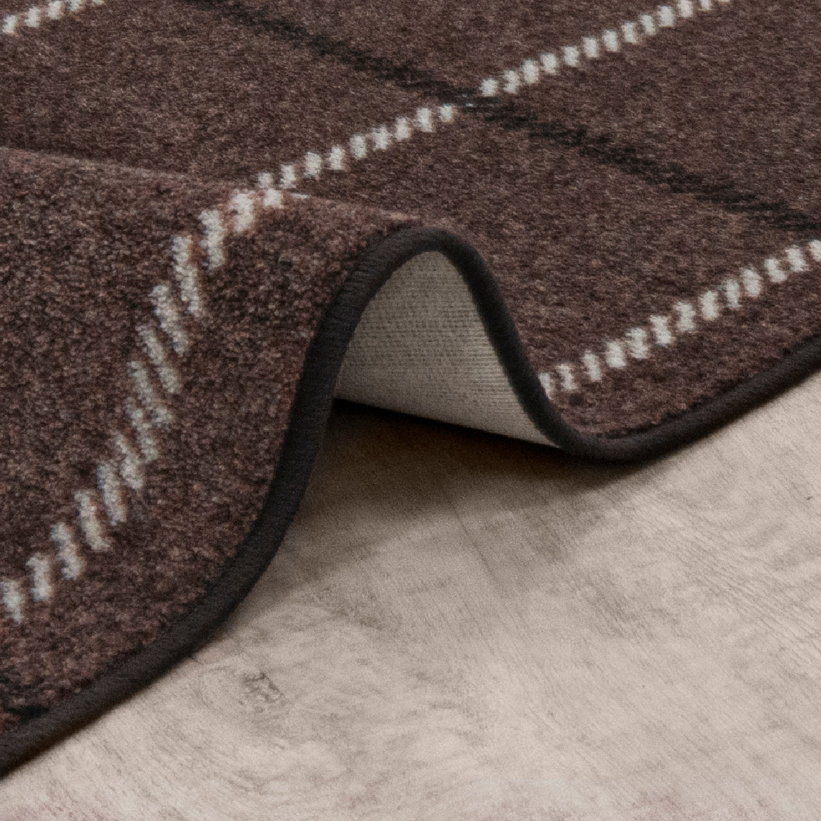 New Haven 7'8" x 10'9" area rug in color Espresso