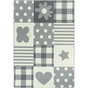 Patchwork Girl 5'4" x 7'8" area rug in color Cloudy