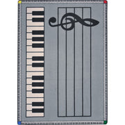 Play Along 10'9" x 13'2" area rug in color Gray w/ keys