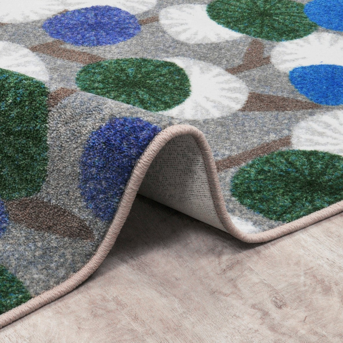 Posy Grove 7'8" x 10'9" area rug in color Peacock