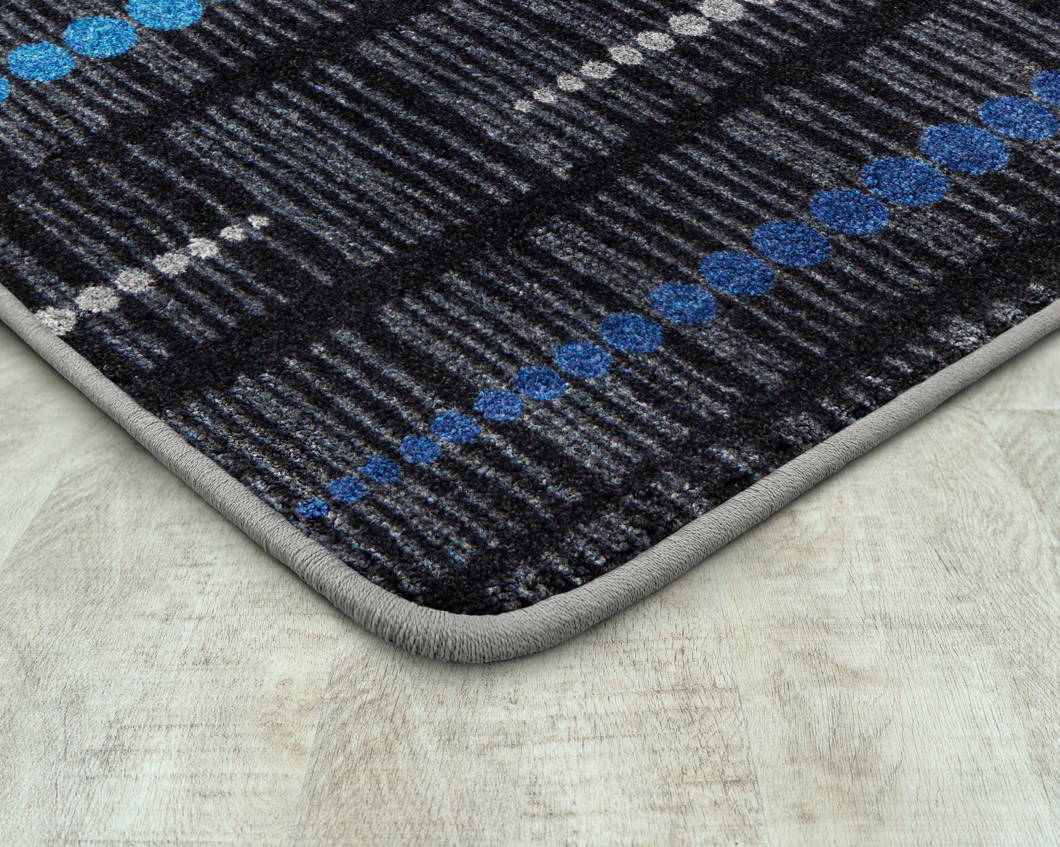 Recoil 10'9" x 13'2" area rug in color Sapphire