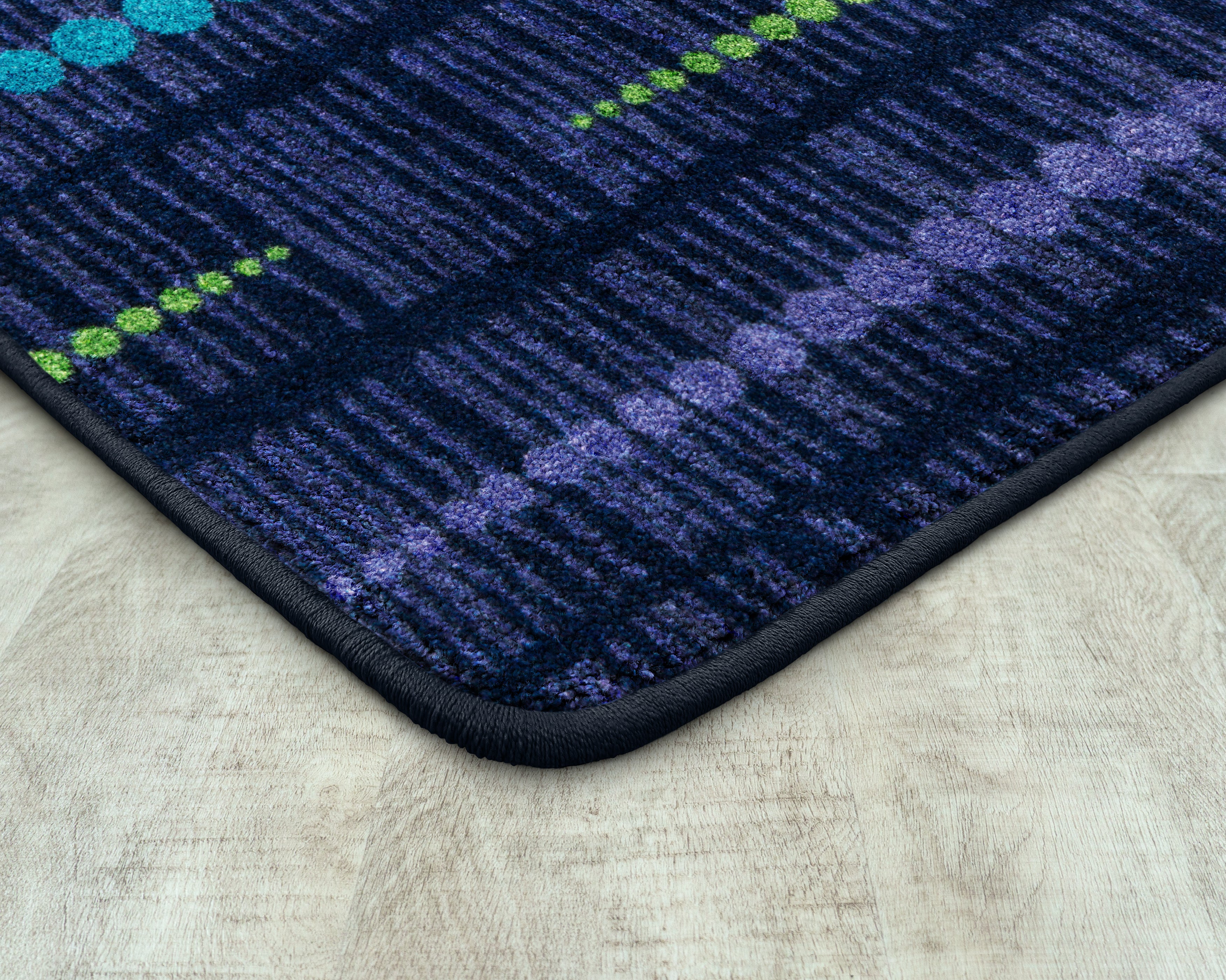 Recoil 5'4" x 7'8" area rug in color Violet