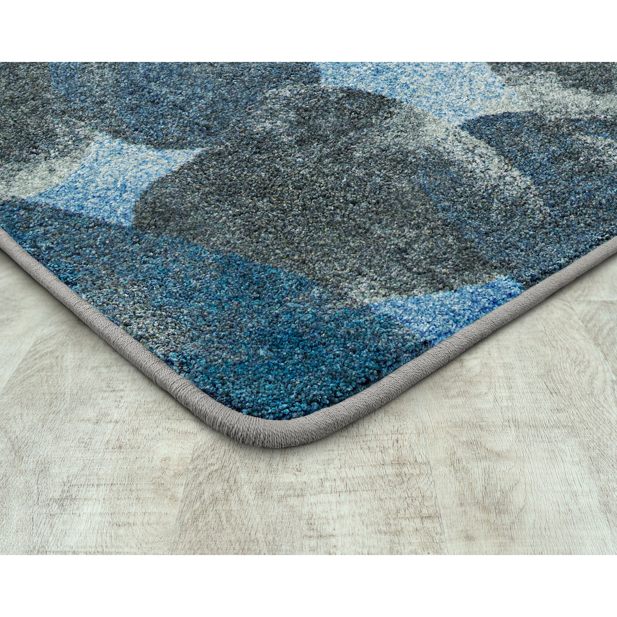 Riverstone 5'4" x 7'8" area rug in color Blue