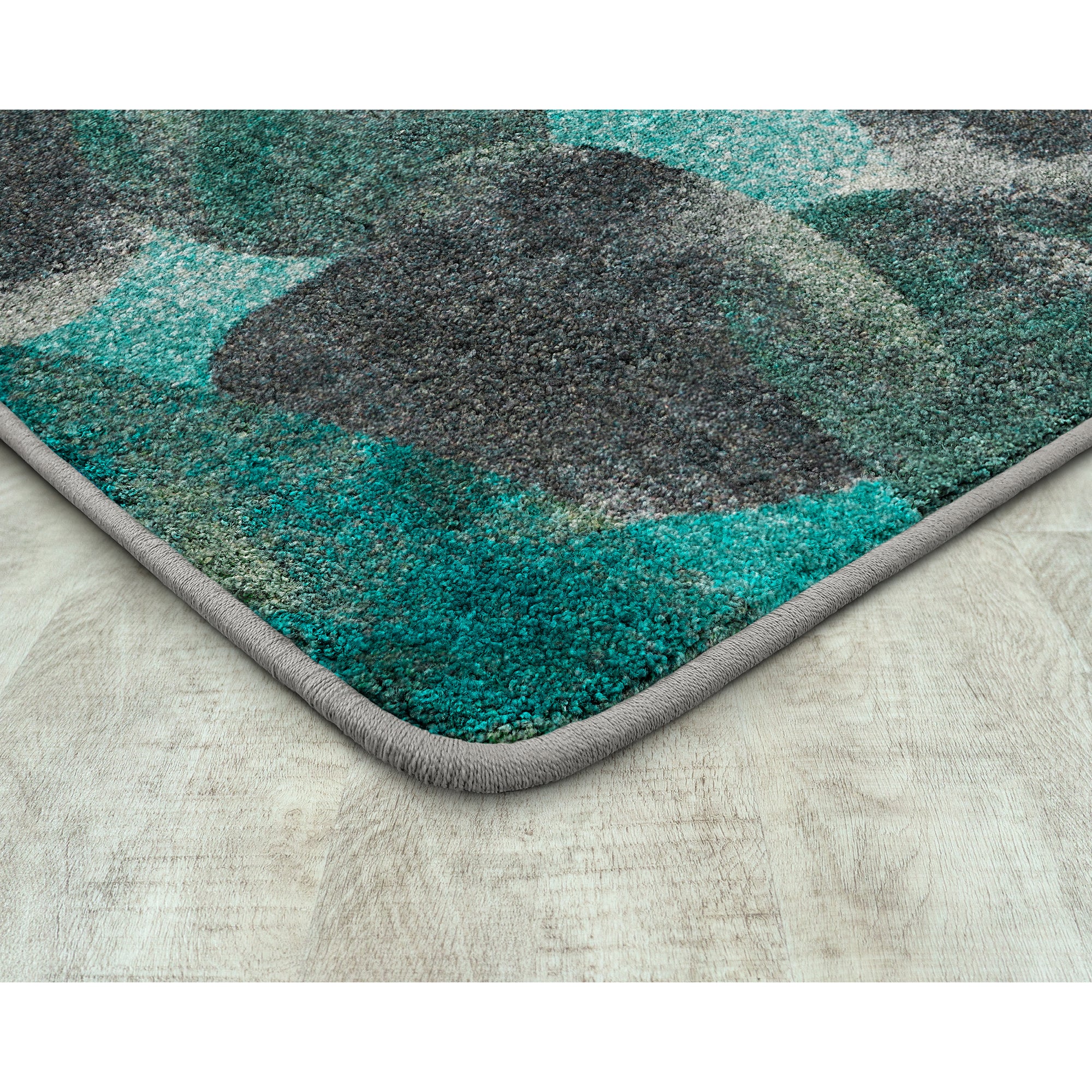 Riverstone 5'4" x 7'8" area rug in color Teal