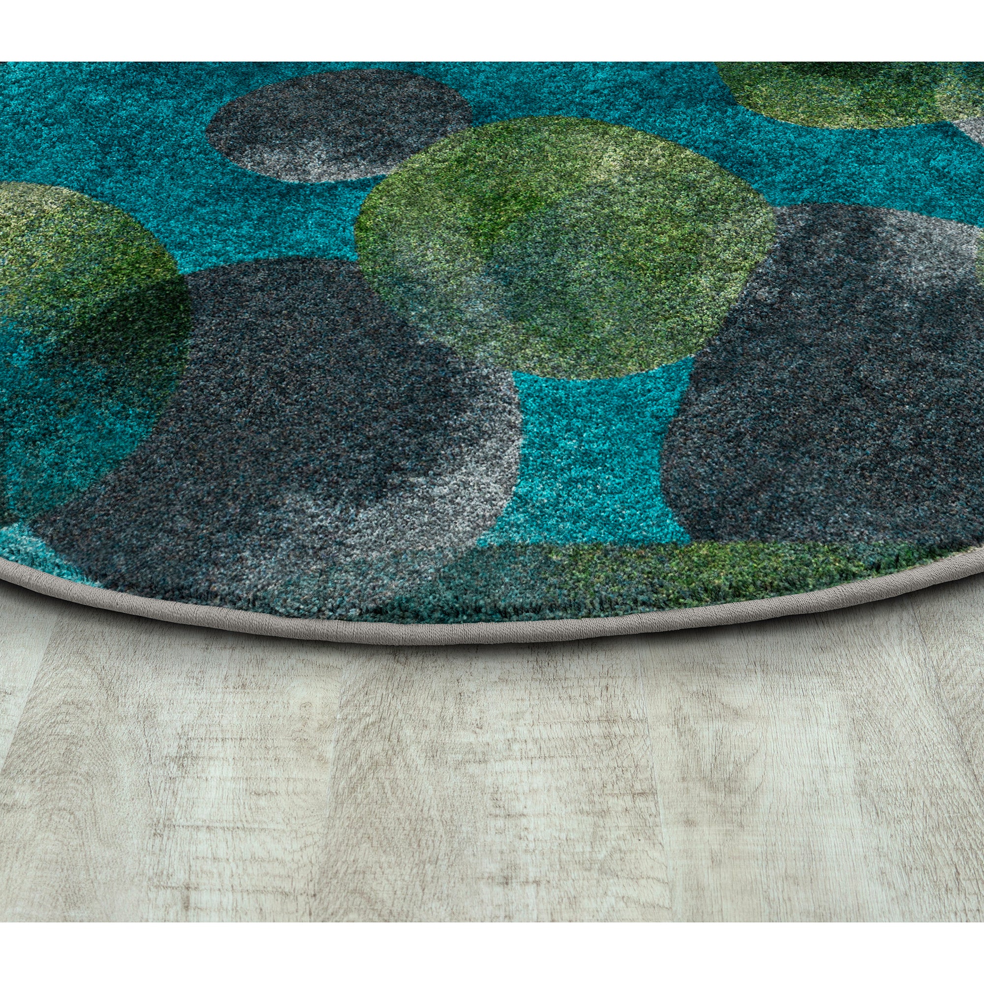Riverstone 7'7" Round area rug in color Teal
