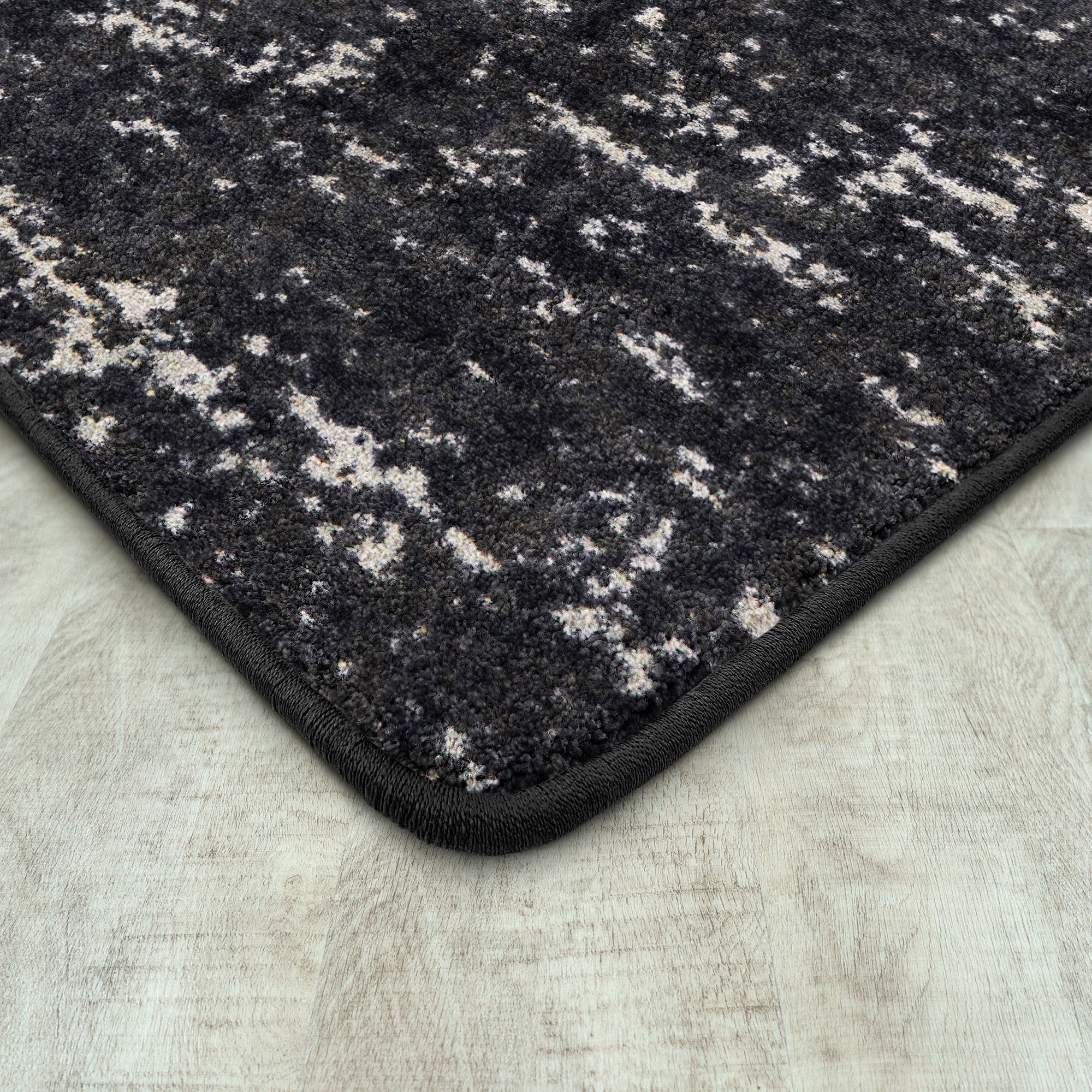 Stretched Thin 3'10" x 5'4" area rug in color Onyx
