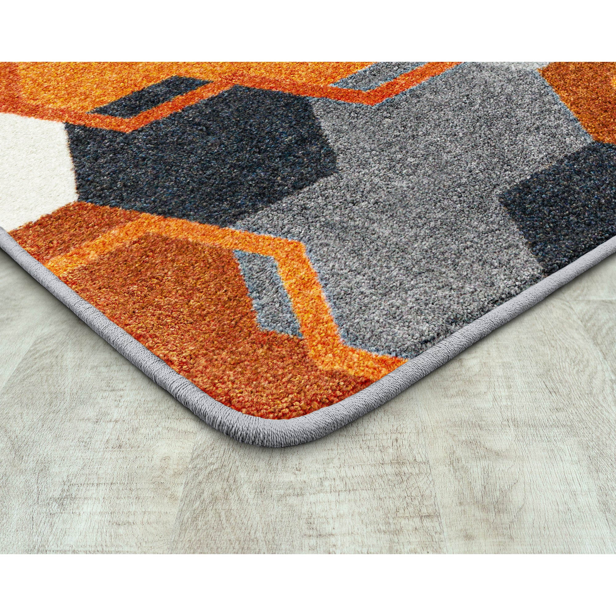 Team Up 5'4" x 7'8" area rug in color Orange