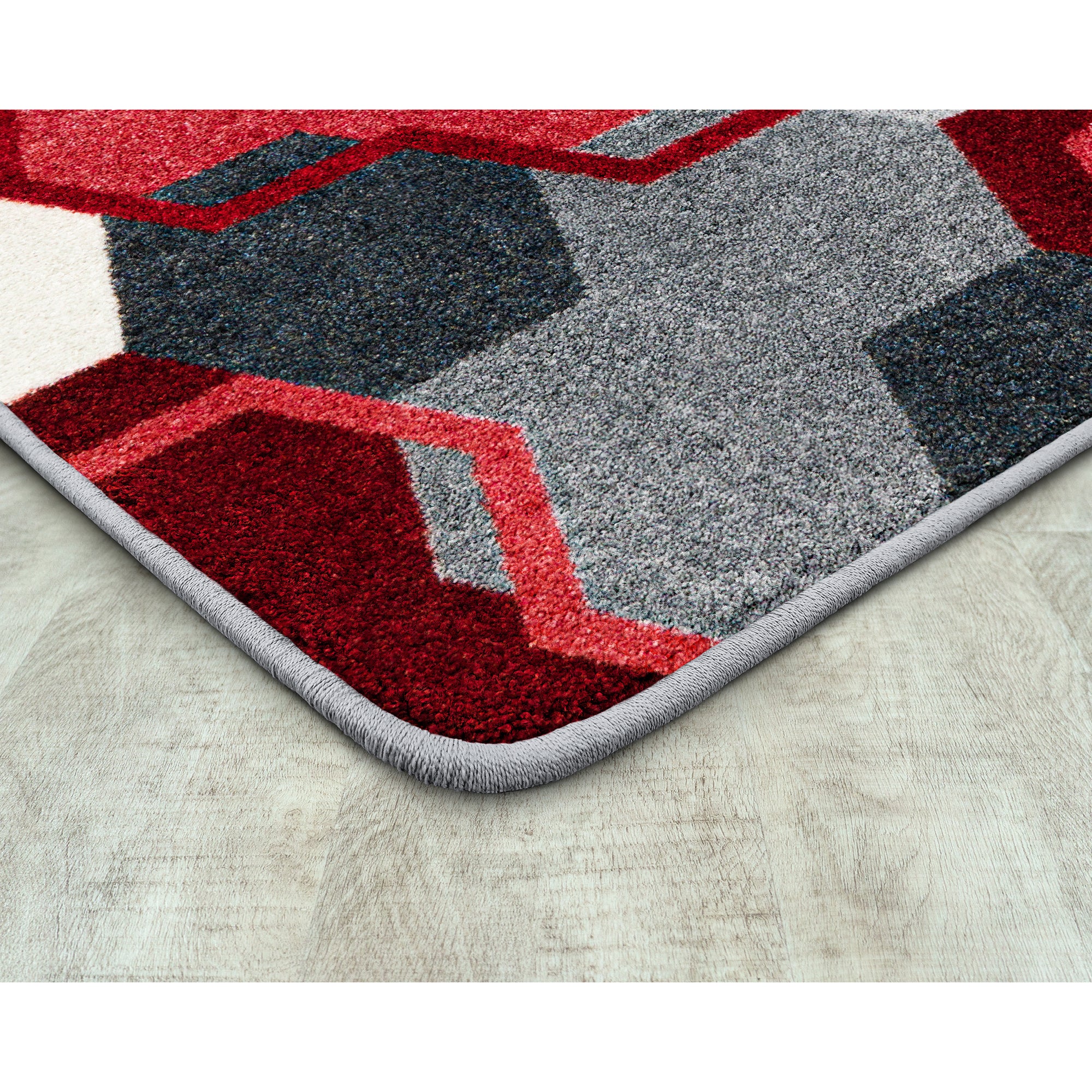 Team Up 5'4" x 7'8" area rug in color Red