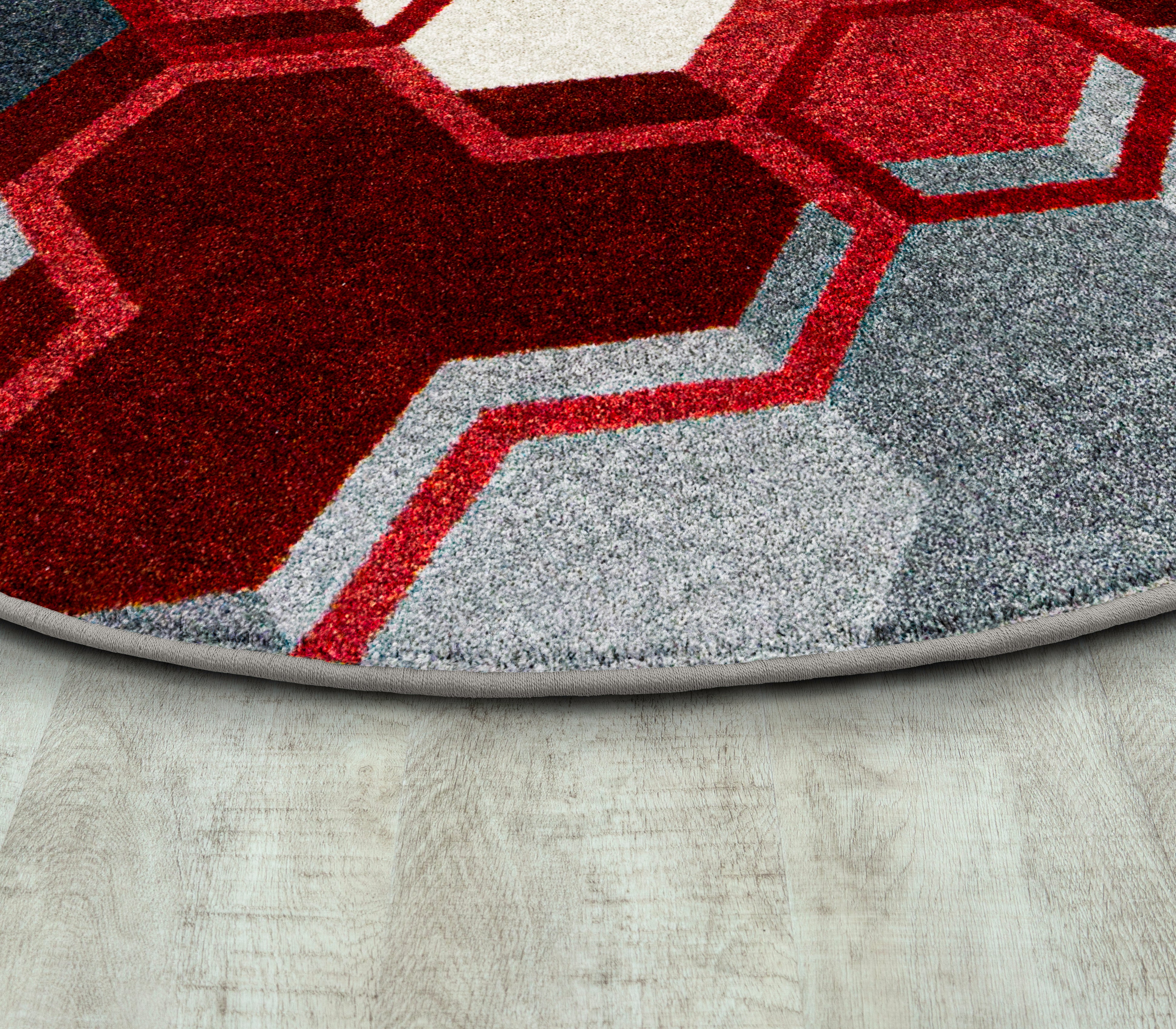 Team Up 7'7" Round area rug in color Red