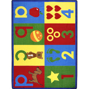 Toddler Basics 3'10" x 5'4" area rug in color Bold