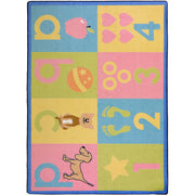 Toddler Basics 10'9" x 13'2" area rug in color Soft