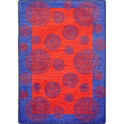 Whimzi 5'4" x 7'8" area rug in color Red