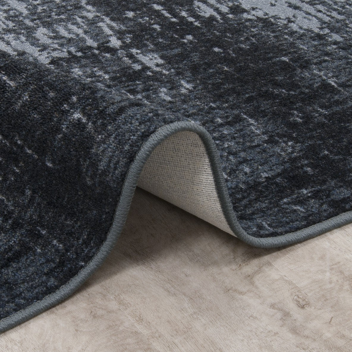 Winterhaven 5'4" x 7'8" area rug in color Charcoal